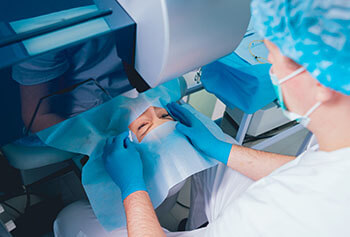 Doctor Using a Laser